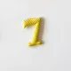 Fém szám žltá 7